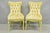 Vintage French Hollywood Regency Yellow Tufted Side Chairs with Drape Carved Frames - a Pair. Circa Mid 20th Century....