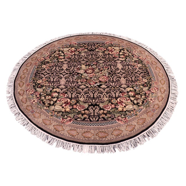 This hand‑knotted Pak Persian round rug showcases the finest expression of traditional Persian artistry. Each piece is...