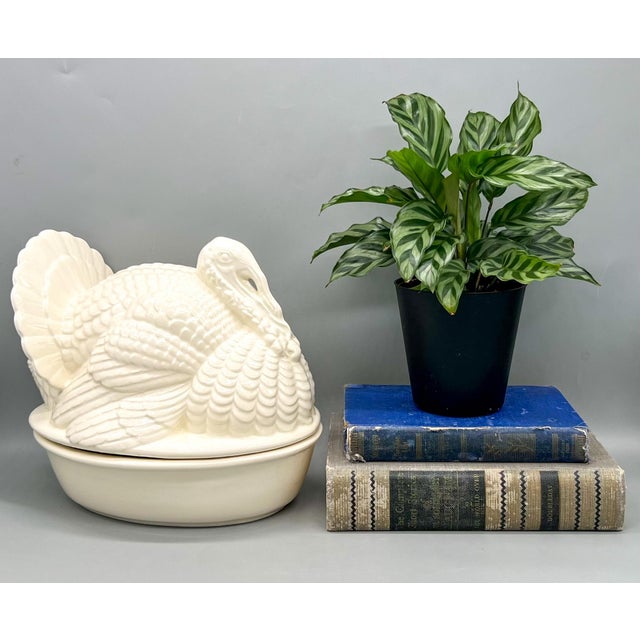 Charming vintage ceramic turkey tureen, beautifully molded in a crisp white glaze. The lidded dish is shaped as a resting...