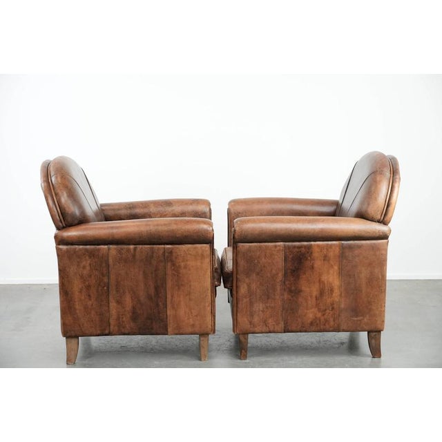 We are offering this beautiful set of two vintage sheepskin armchairs in warm colors with a distinctive look. This...