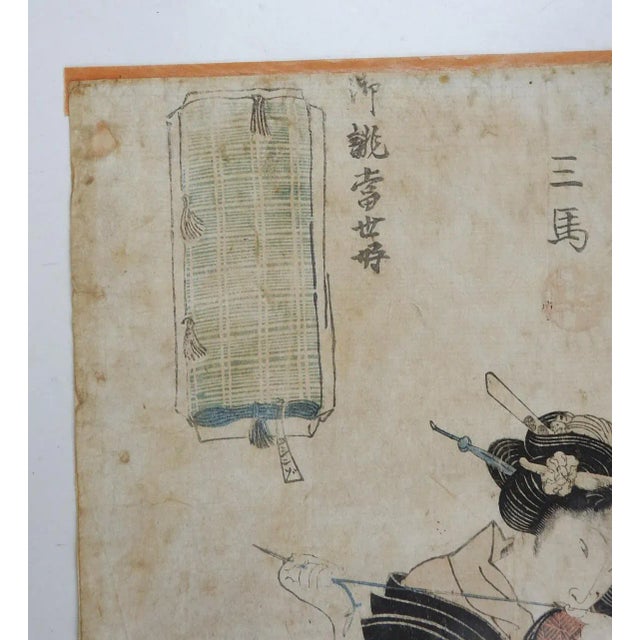 Early 19th century Japanese woodblock print by Kunisada I Utagawa (1786-1865), beauty repairing sleeves. Publisher,...