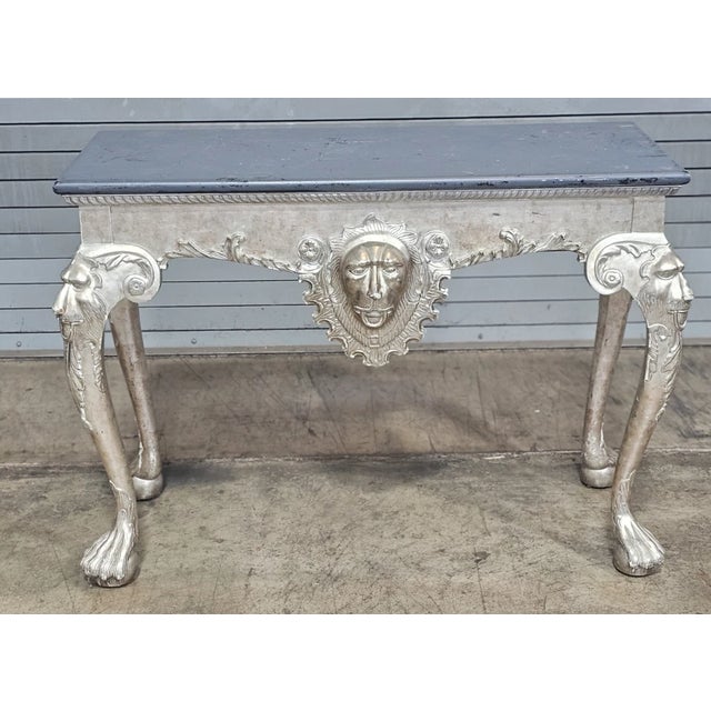 Store Item: Antique Silver Gilt Lion Mask with Lion Legs W Paw and Claw Feet Console Table Description: Table features a...