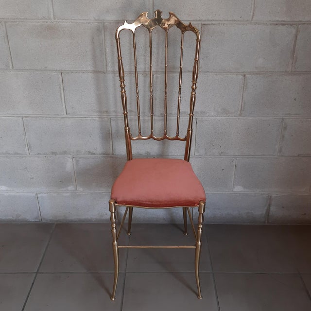 Stunning vintage Chiavari chair, handcrafted in polished brass and red/pink padded fabric, excellent Italian...