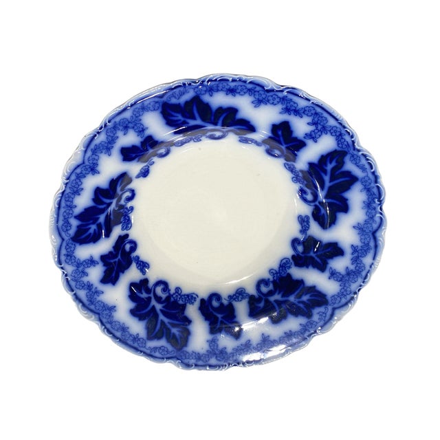 The Vintage JOHNSON BROTHERS Flow Blue NORMANDY Soup Plate is a charming and authentic piece of dinnerware from the United...