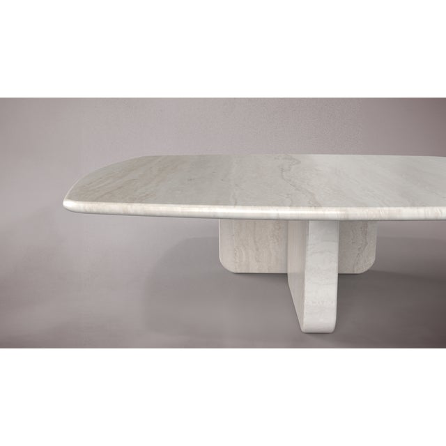Bring a touch of timeless elegance to your living space with this square travertine coffee table. Crafted from natural...
