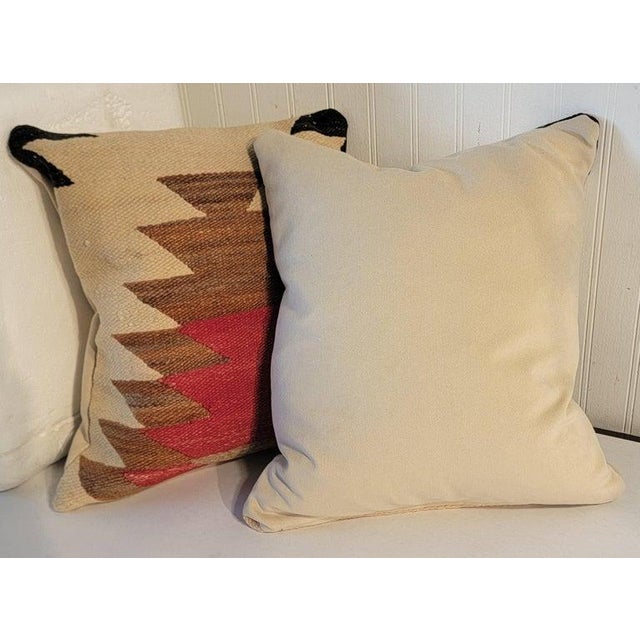 This pair of Wool eye dazzler weaving pillows are in amazing muted colors and have linen backings.The inserts are down &...