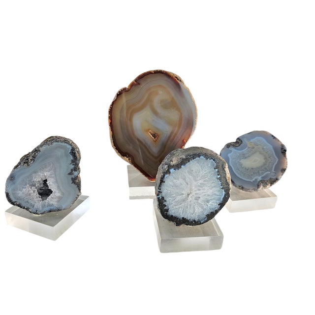 This set of 4 geodes clusters is high quality of quartz and agate stones. The stones are rough on the outside and polished...