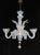 Vintage Murano style chandelier made of opalescent white glass with a cluster of leaves and stemmed flowers that bloom...