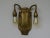 An extraordinary pair of wall lights in typical Art Nouveau style made in brass. The two wall lights are back worked out,...