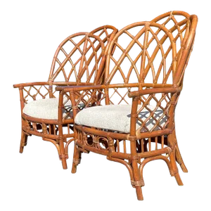 Late 20th Century Vintage Coastal Bent Rattan Wingback Chairs - a Pair