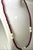 A 14k gold necklace with Rhodolite garnet that exhibits distinct pinkish-violet color tone, similar to ruby. Accompanied...