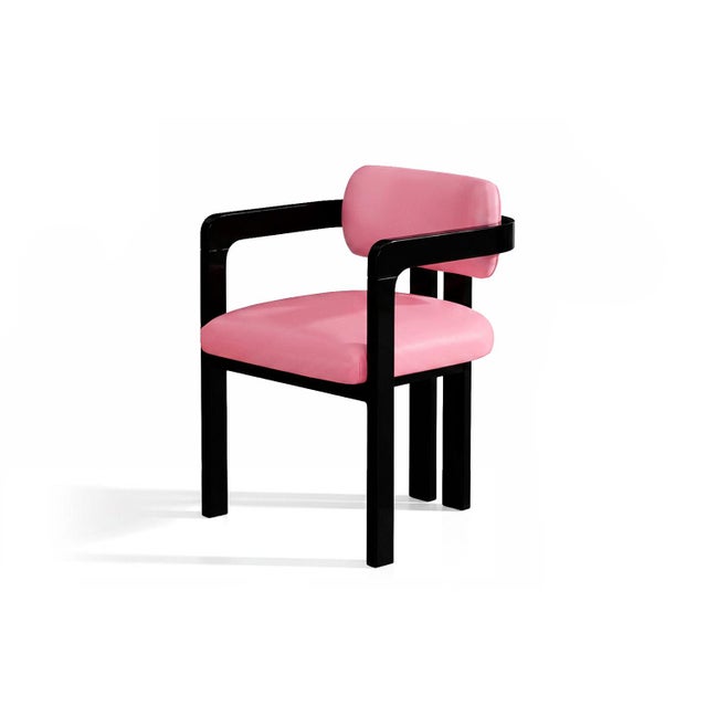 Vértigo Dining Chair in Pink Velvet with Black Legs. The Vértigo Dining Chair captures the tension between chaos and...