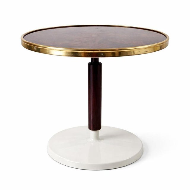 A beautiful 1950s Italian side table, originally made for use on yachts — which explains the solid construction and...