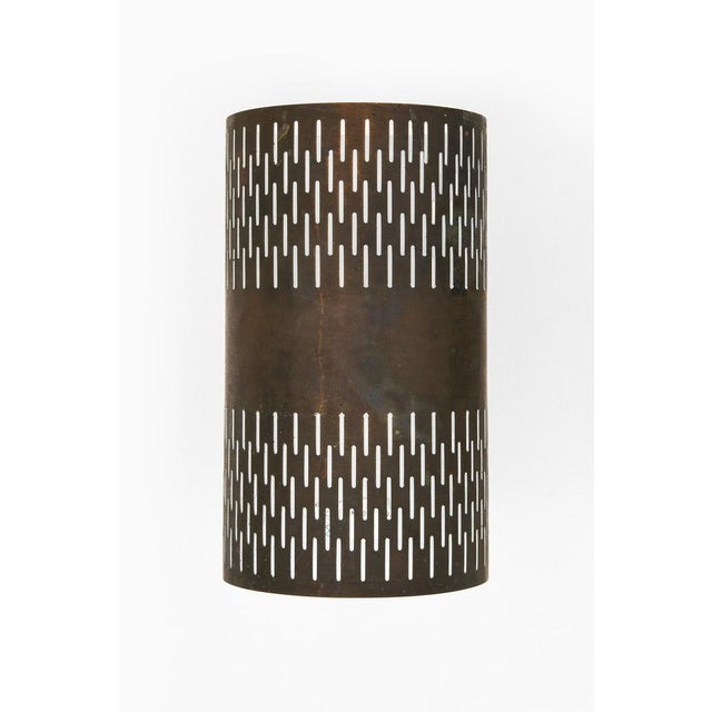 This rare pair of wall lamps, a variant of model 1040, designed by hans bergström and produced by ateljé lyktan in åhus,...