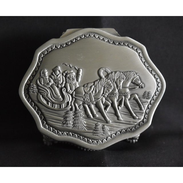 Antique - 1920's Trinket Box with Lion Paw Feet. Made of Silver plate with an Embossed Winter Scene on the lid and Santa....