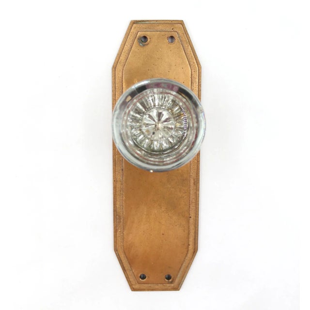 Art Deco style round shaped clear glass door knob with a Sargent made brass back plate. The original back plate mounting...