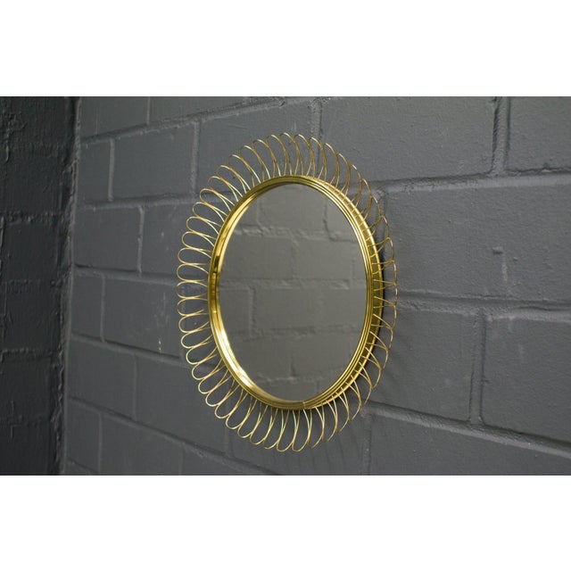 Small Spiral Brass Mirror, 1950s, in Very Good conditions. Designed 1950 to 1959