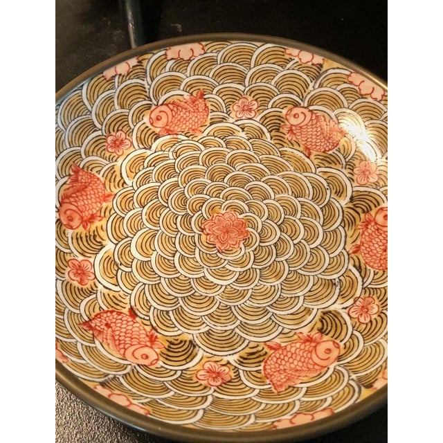 The colors and design of this lovely Vintage Japanese Porcelain Brass Encased Koi Bowl make this decorative item —...