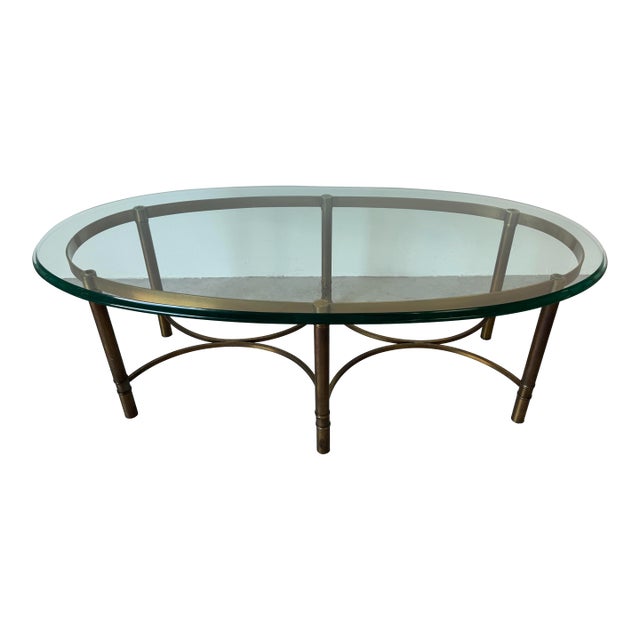 1970s Hollywood Regency Oval Brass Coffee Table With Beveled Glass Top For Sale