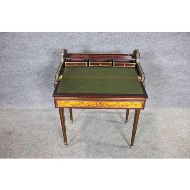 Hand painted. 1 dovetailed drawer. Flip up top containing felt top and 3 small drawers. Brass foot caps and trim....