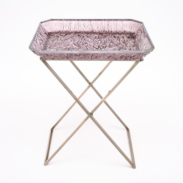 Tray table from France featuring a chrome x-shape base that folds out to support a purple Lucite tray top. The Lucite tray...