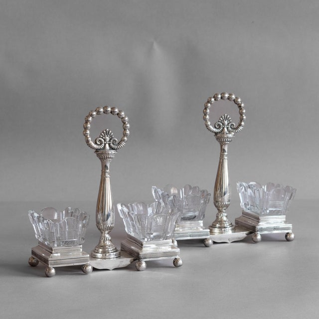 Pair of French glass open salts in silver plated stands. Circa 1890.