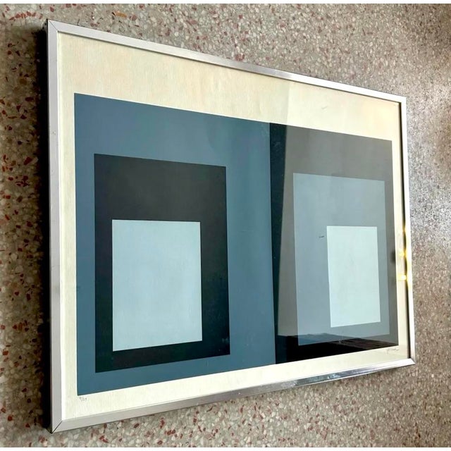 This artwork presents a disciplined study in geometry and perception, with two side-by-side compositions of nested squares...