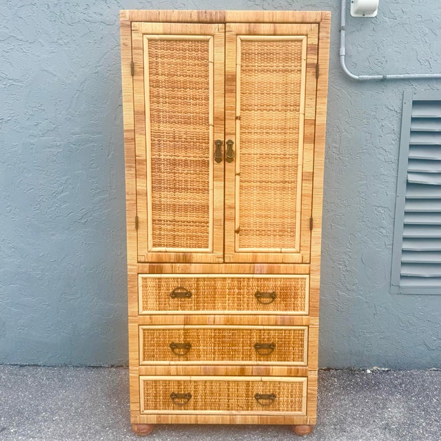 A beautifully crafted boho chic armoire that effortlessly blends coastal elegance with functional versatility. Expertly...