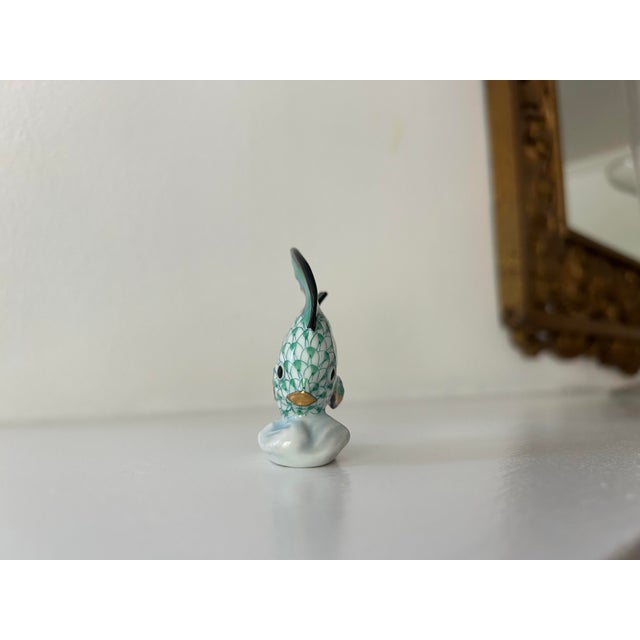 Herend porcelain sailing fish figurine, hand-painted with gilt accents throughout, maker's mark "Herend Hungary" and stamped.