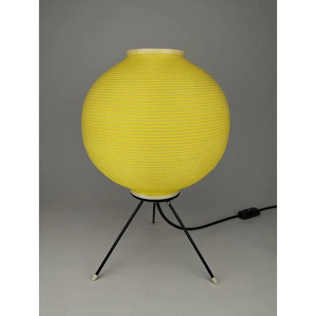 Very rare tripod table lamp from the 1950s. The version is suitable for E27 lamps. European Plug (up to 250V).The wiring...