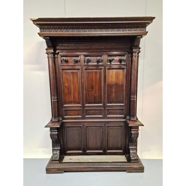 Elegant hallway coat rack.Walnut.Italy.Second half of the 19th century.Dimensions: height 209cm; width 143cm; depth 33cm