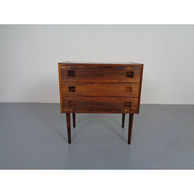 Extraordinary veined Brouer rosewood chest with 3 drawers. Legs are demountable. Made in the 1960s. I have official proof...