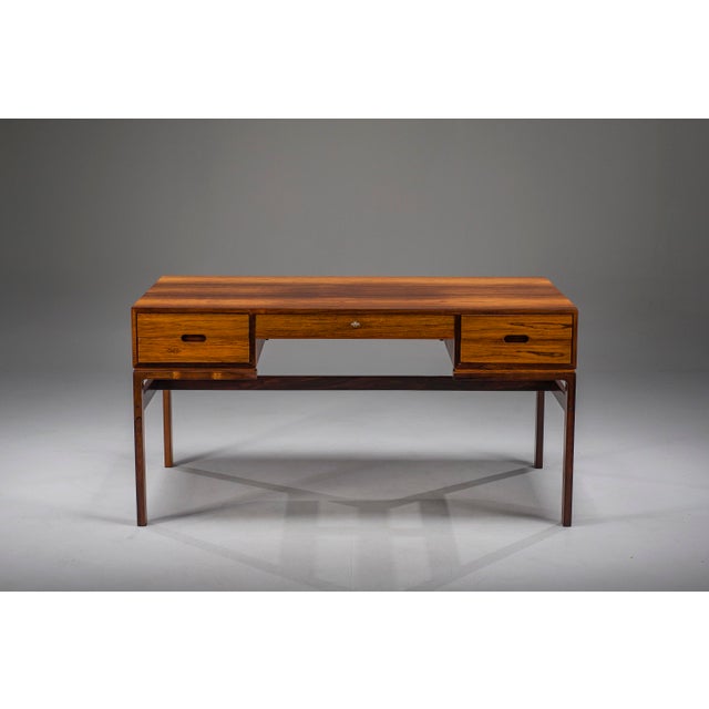 Elegant Model 80 executive desk designed by Arne Wahl Iversen for Vinde Møbelfabrik, Denmark, in the 1950s. A timeless...