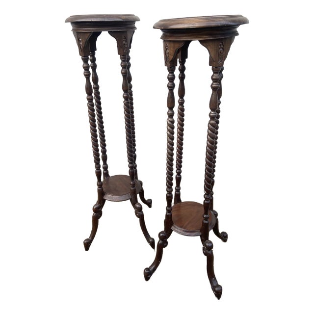 Early 20th Century Victorian Carved Mahogany or Walnut Plant Pedestal Stands Display Columns Torchieres With Turned Legs, a Pair For Sale