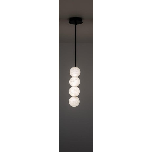 Raim pendant lamp with 4 spheres by united alabaster dimensions: ⌀ 12 cm x h 48 cm (materials: alabaster, copper (matt...