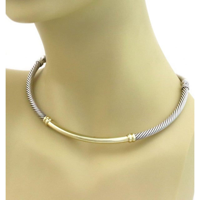 This is a designer David Yurman authentic sterling silver and 14k gold ladies choker necklace. The piece is beautifully...