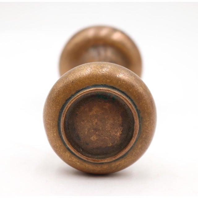 Vintage concentric passage door knobs made of brass with a patina finish. Good condition with surface wear from prior use....