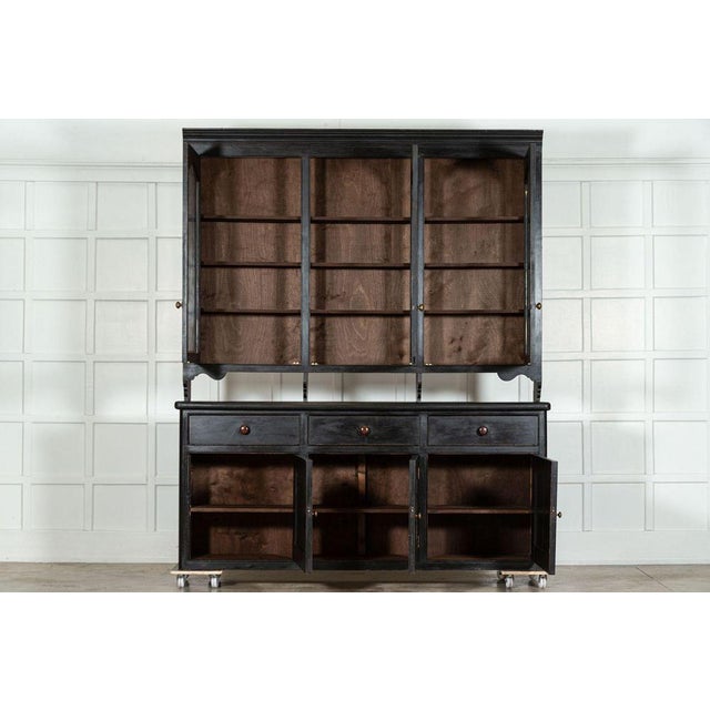 Circa 1870 large 19th century ebonised english glazed pine dresser. Base w217 x d46 x h96 cm top w210 x d34 x h158 cm...