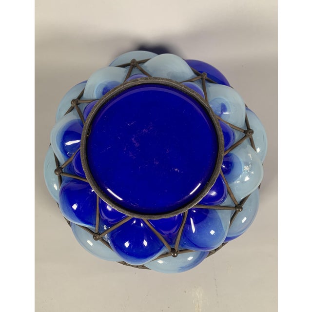 Blown glass bowl in a wrought iron frame Signed André DELATTE (c. 1887-1953) Nancy Blue and white nuanced glass French...