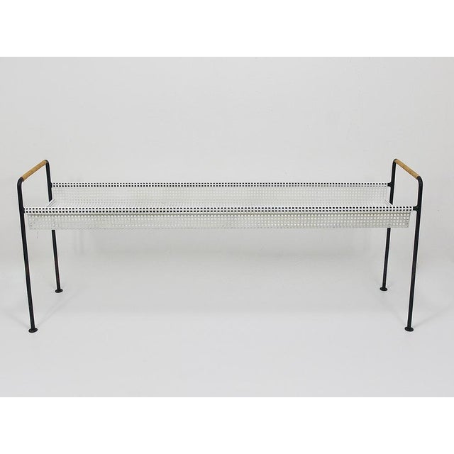 A beautiful rectangular mid-century flower bench / plant table from the 1950s. This authentic vintage minimalist piece was...