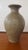 This lovely Mid 20th Century Chinese Yaozhou Ware Carved Phoenix Tail Baluster Vase measures 8 5/8" high and 5 1/2“ wide...