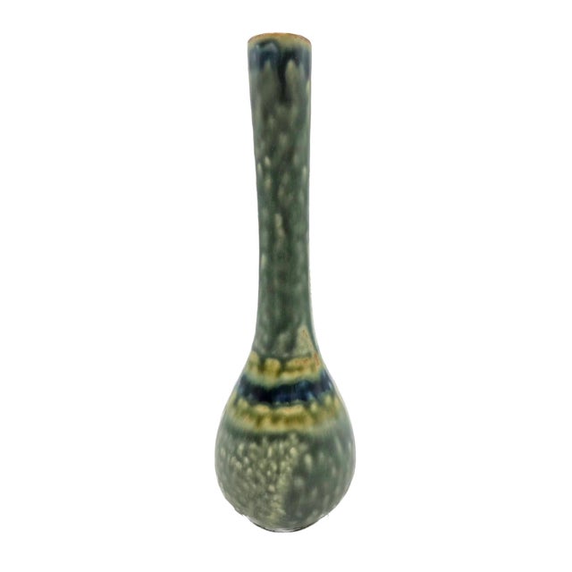 Offered is a circa. 1970s Danish faience stem vase. There is no maker's mark or label. The matte tin-glazed earthenware is...
