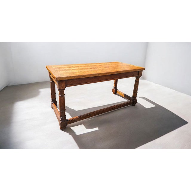 Featured is a Vintage Oak Herringbone Design Parquetry Writing Desk by Century. It includes two drawers with brass pulls...