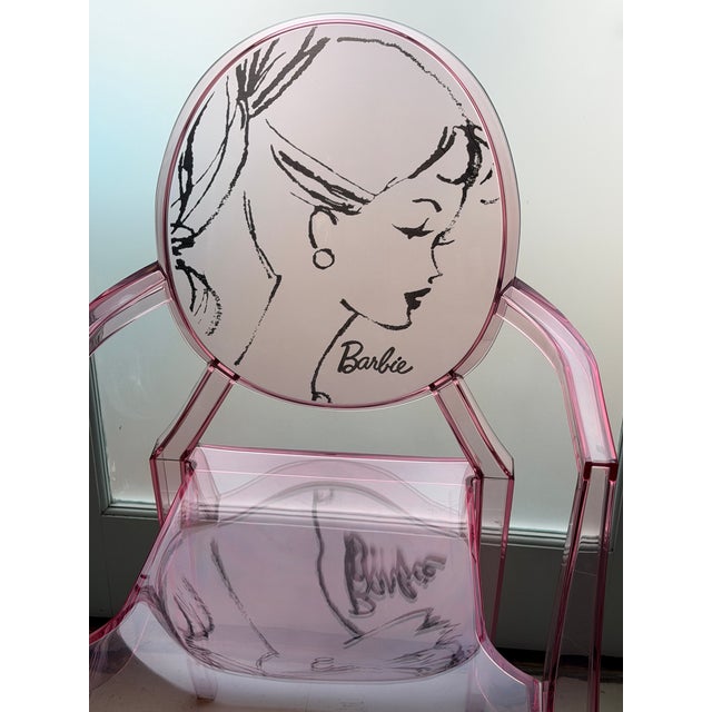A rare and highly collectible collaboration between Kartell and Barbie, this iconic Louis Ghost chair features a delicate...