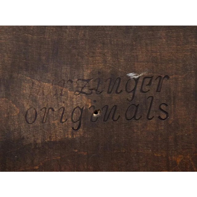 This incredible floor lamp with built-in side table by Tommi Parzinger for Parzinger Originals is finished in a black...