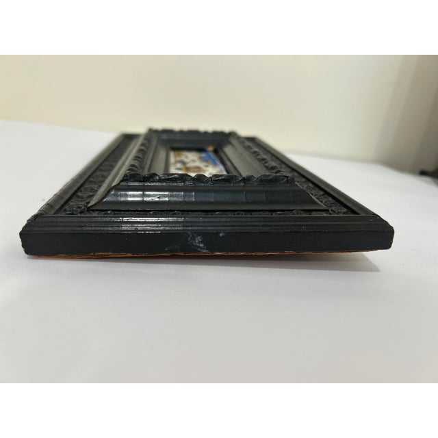 This piece was purchased at an antique auction in Moscow in 1981. The heavy dark wood painted frame encases a piece of an...