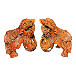 Mid 20th Century Pair Chinese Carved Hardwood Foo dogs with Rolling Pearls & Puzzle Balls