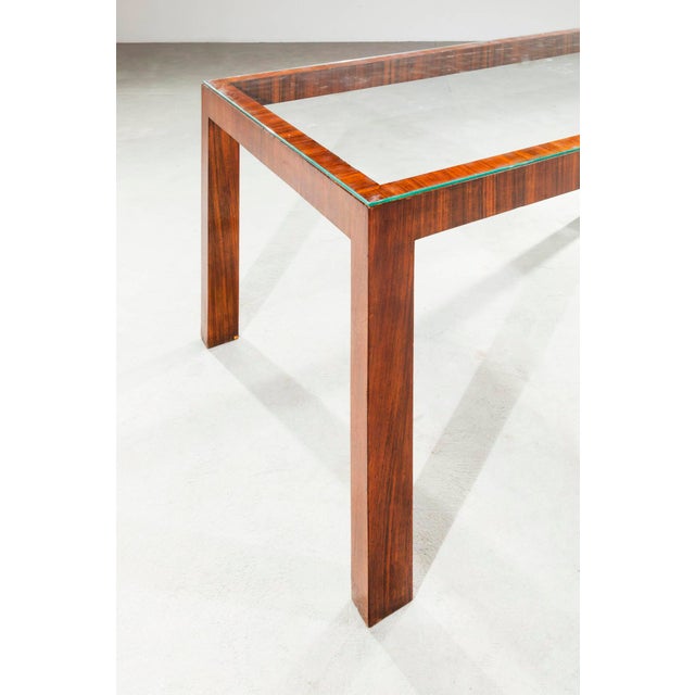 A table designed by renowned artist Emanuele Rambaldi. This piece perfectly embodies the Italian transition to pre-war...