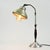This aluminum desk lamp will be excellent for a work or writing desk. Its adjustable shade position and height make it...
