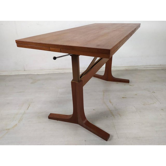 Coffee table with system, opening into a dining table h71 w107cm.